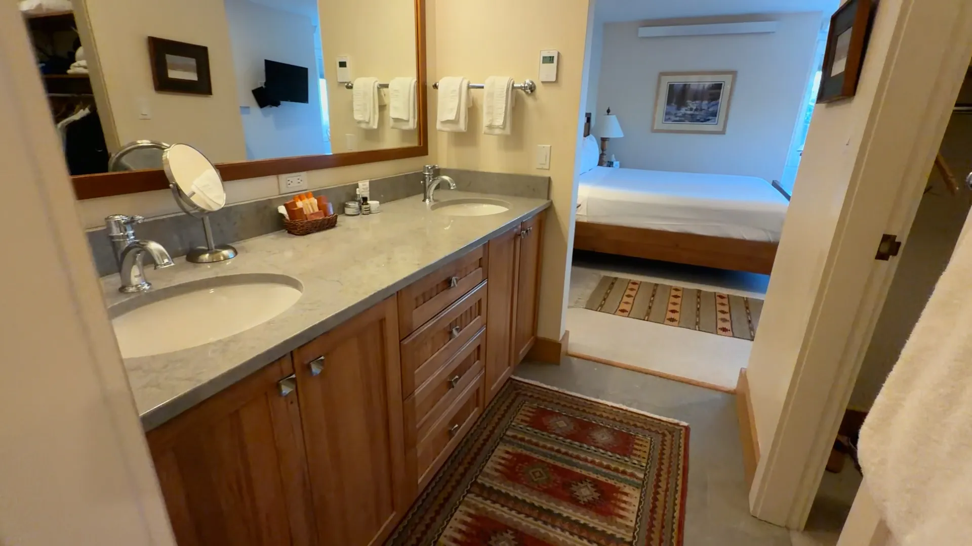 Master bathroom double vanity with view into bedroom - Spring Creek Ranch Jackson Hole
