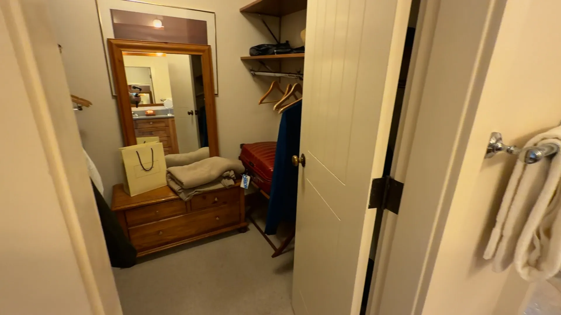 Walk-in closet with dresser, full-length mirror and luggage rack - Spring Creek Ranch Jackson Hole