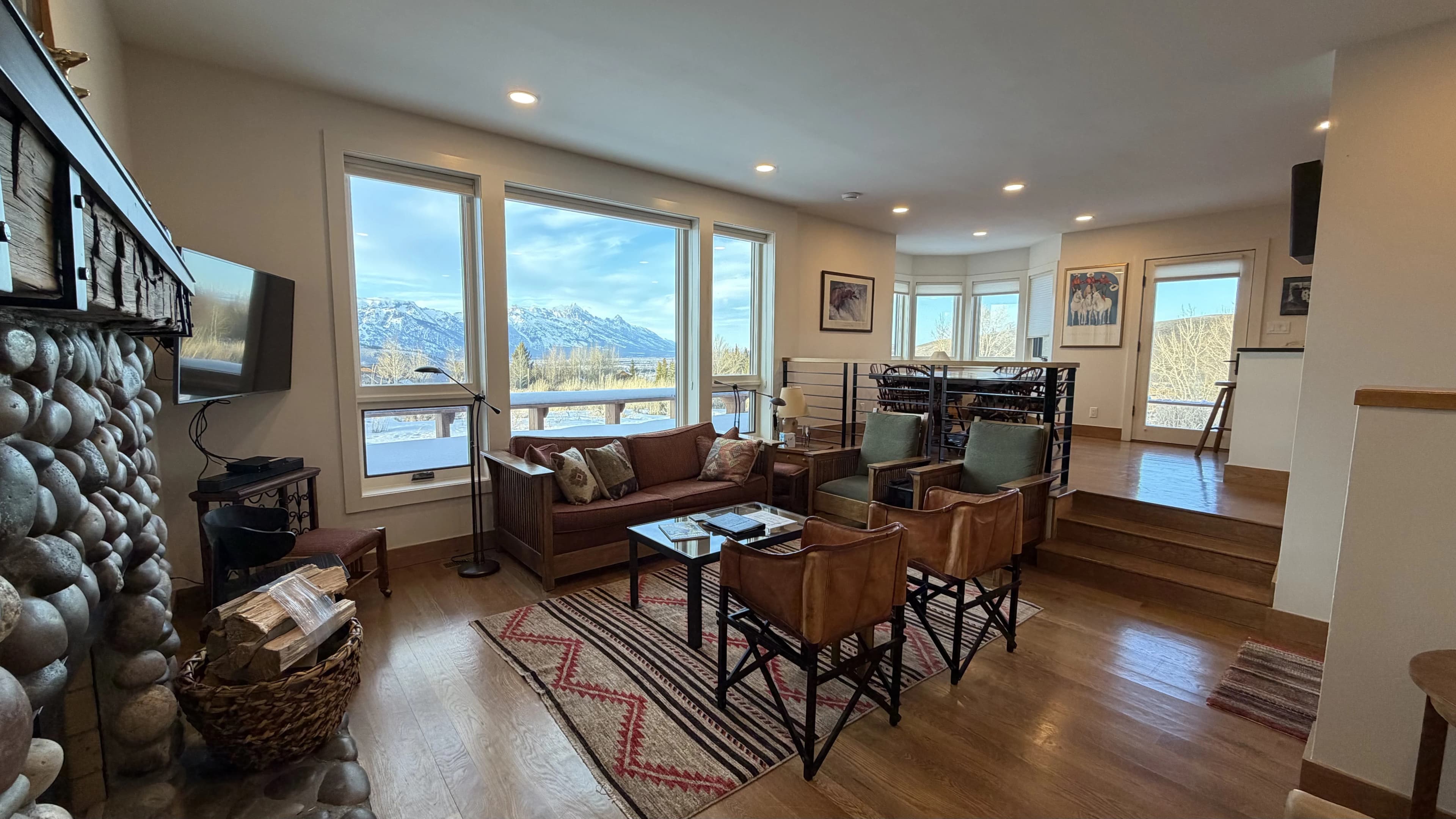 Living room with Teton views - Spring Creek Ranch vacation rental Wyoming