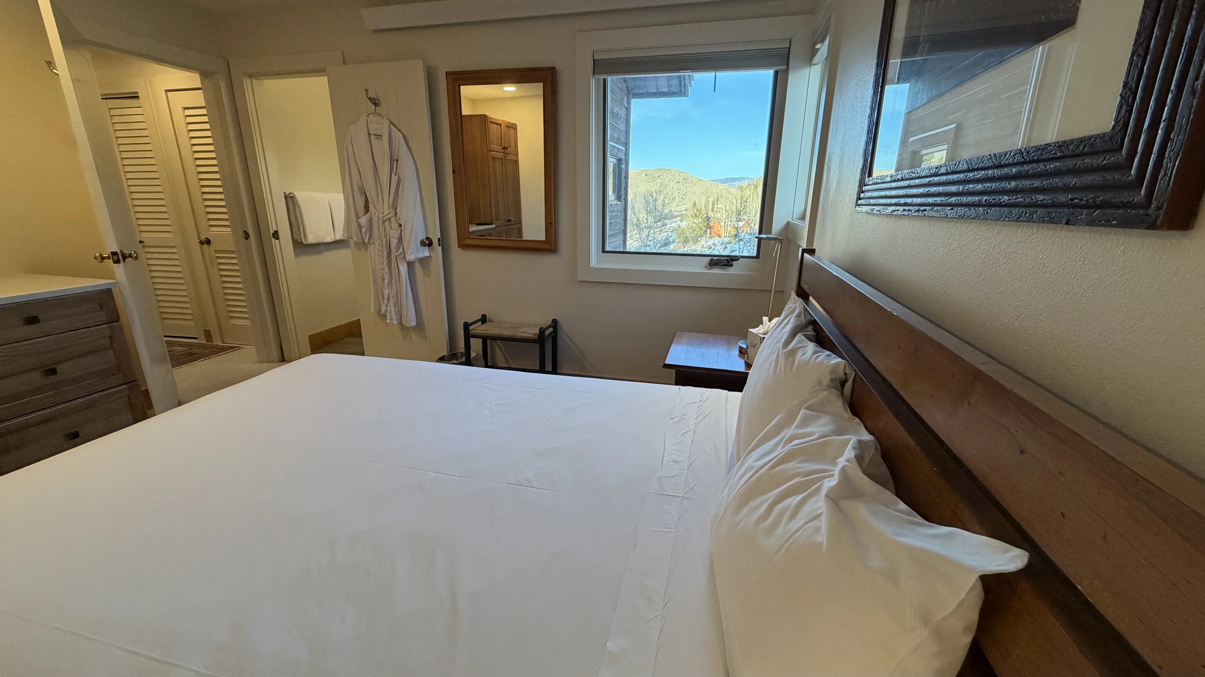 Queen bedroom with robe - Spring Creek Ranch vacation rental