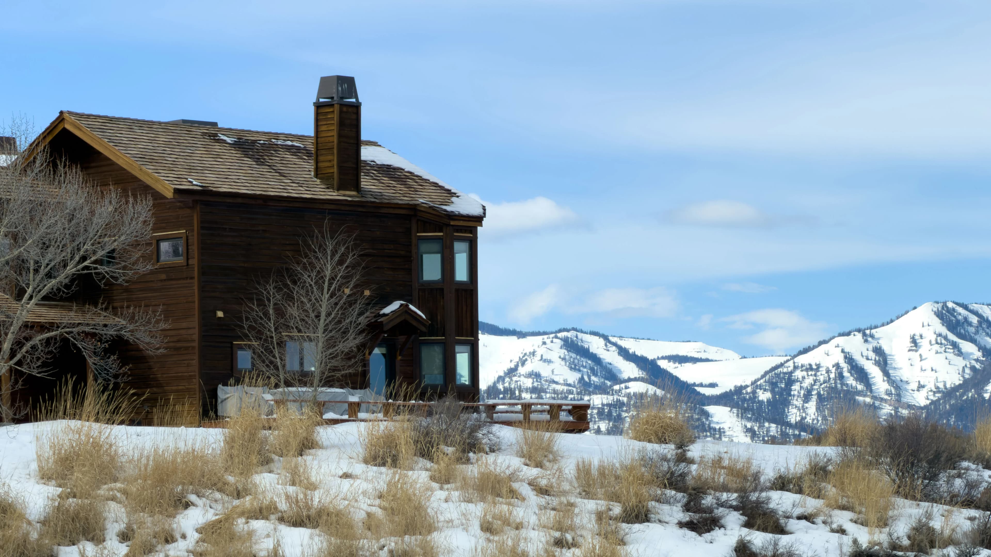 Spring Creek Ranch exterior with mountain views